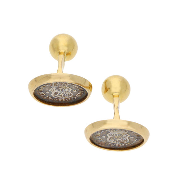 Mancuernillas diseño especial firma Tane con aplicaciones de plata en oro amarillo 18 kilates.