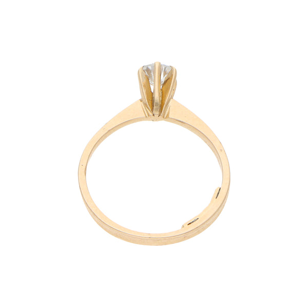 Anillo solitario con diamante en oro amarillo 14 kilates.