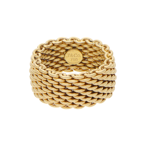 Argolla flexible firma Tiffany & Co. en oro amarillo 18 kilates.