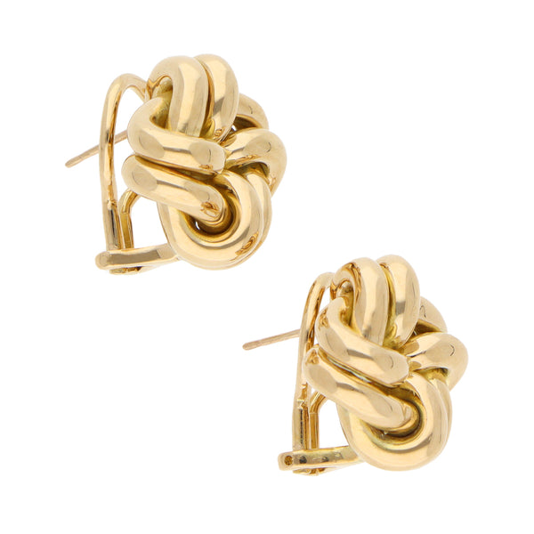 Aretes diseño especial motivo nudo firma Tane en oro amarillo 18 kilates.