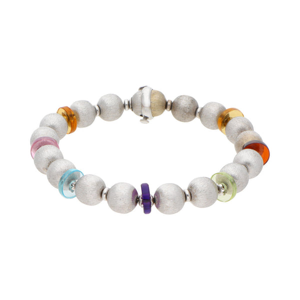 Pulsera eslabón combinado con sintéticos en oro blanco 14 kilates.