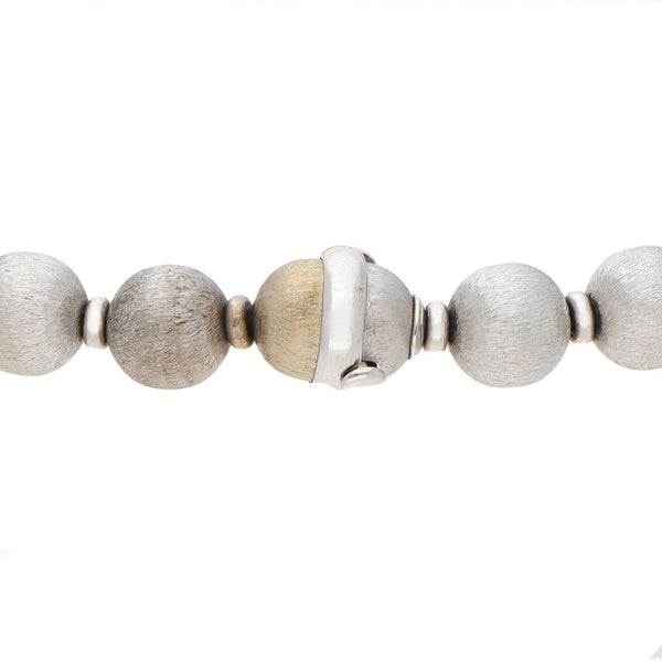 Pulsera eslabón combinado con sintéticos en oro blanco 14 kilates.