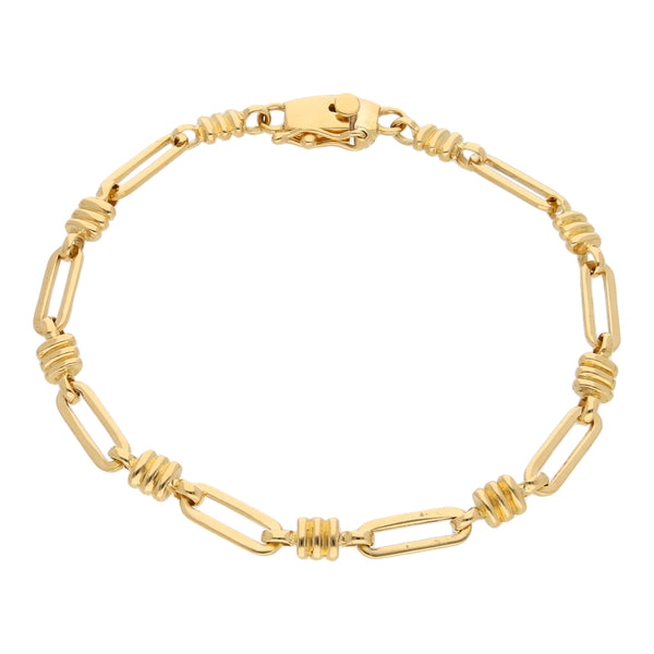 Pulsera eslabón combinado en oro amarillo 18 kilates.