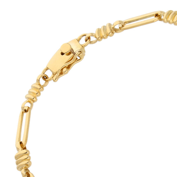 Pulsera eslabón combinado en oro amarillo 18 kilates.