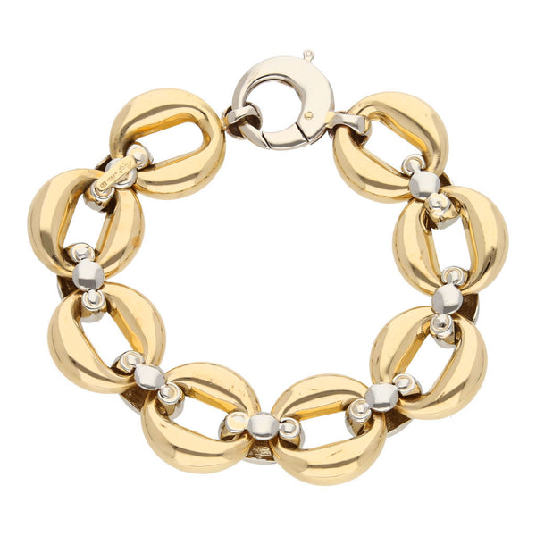 Pulsera eslabón cruzado combinado en oro dos tonos 14 kilates.