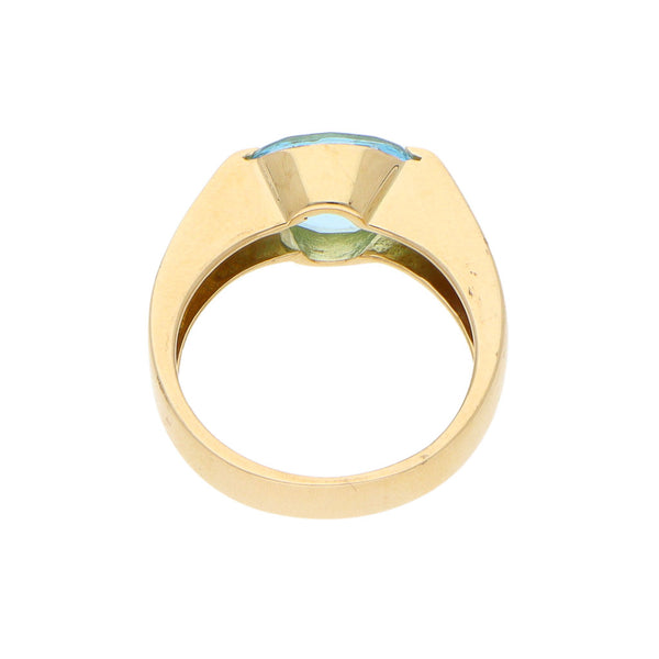 Anillo estilizado con sintético en oro amarillo 18 kilates.