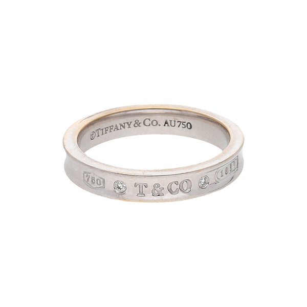 Anillo diseño especial con diamantes firma Tiffany & Co. en oro blanco 18 kilates.