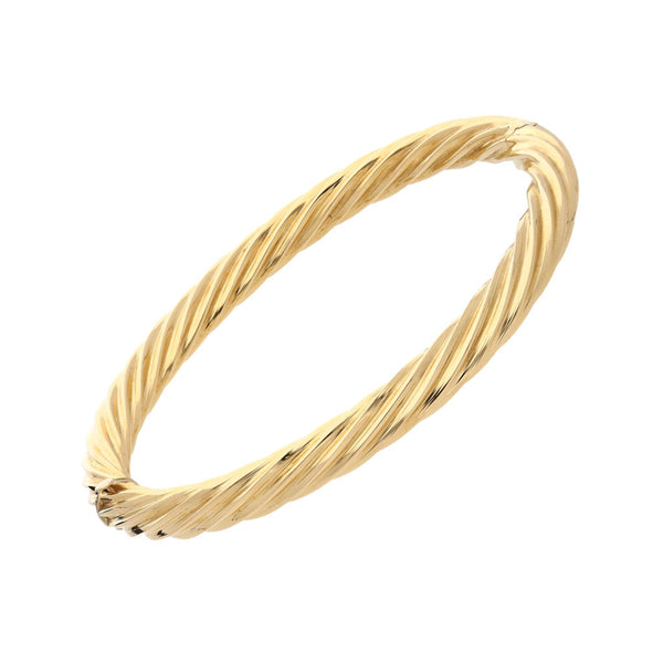 Pulsera de arillo ovalada hueca en oro amarillo 14 kilates.