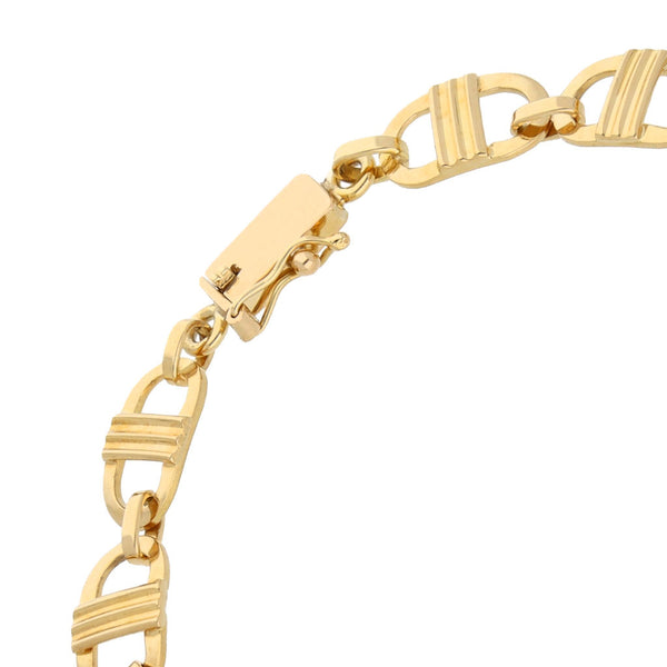 Pulsera eslabón combinado en oro amarillo 18 kilates.
