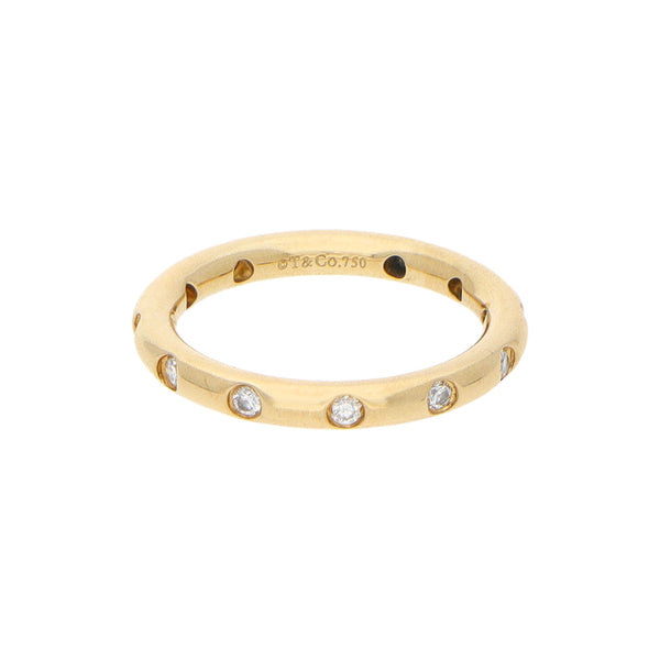 Anillo estilizado con diamantes firma Tiffany & Co. en oro amarillo 18 kilates.