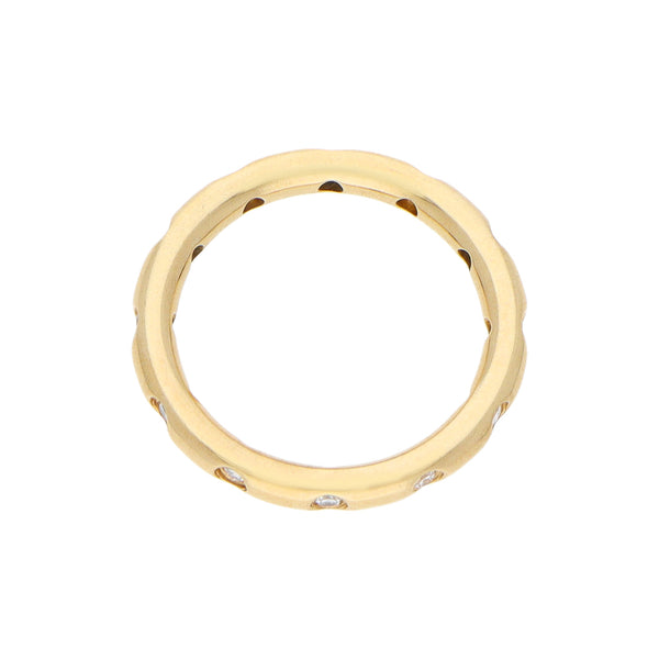 Anillo estilizado con diamantes firma Tiffany & Co. en oro amarillo 18 kilates.