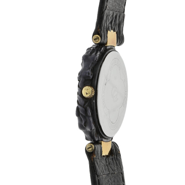 Reloj Carrera y Carrera para dama caja en titanio vistas oro amarillo 18 kilates.