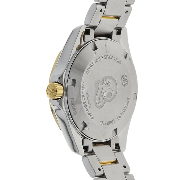 Reloj Tag Heuer para dama modelo Aquarecer vistas en oro amarillo 18 kilates.