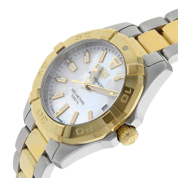 Reloj Tag Heuer para dama modelo Aquarecer vistas en oro amarillo 18 kilates.