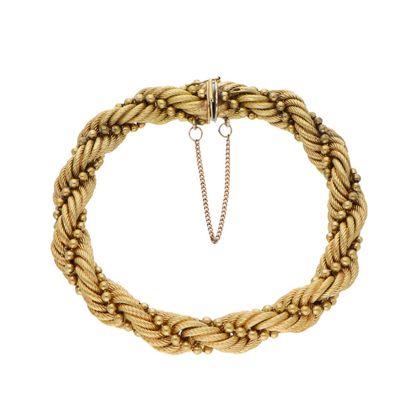 Pulsera eslabón combinado en oro amarillo 18 kilates.