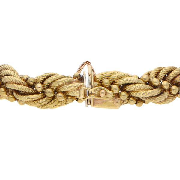 Pulsera eslabón combinado en oro amarillo 18 kilates.