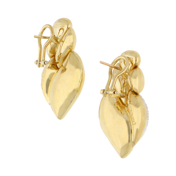 Aretes huecos con diamantes en oro amarillo 18 kilates.