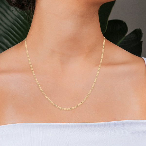 Collar de tres eslabones por uno facetados en oro amarillo 14 kilates.