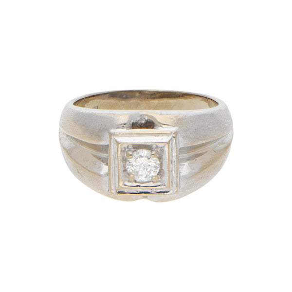 Anillo estilizado con diamante en oro blanco 14 kilates.