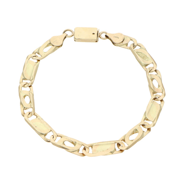 Pulsera eslabón combinado en oro amarillo 14 kilates.