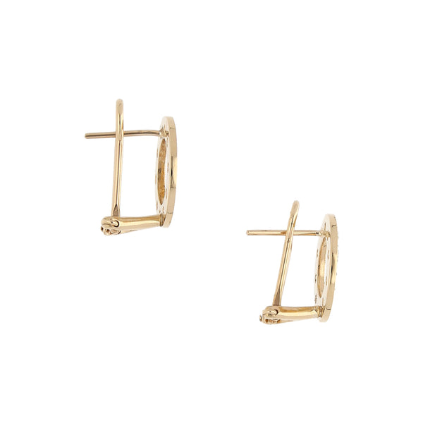 Aretes calados con diamantes en oro amarillo 14 kilates.