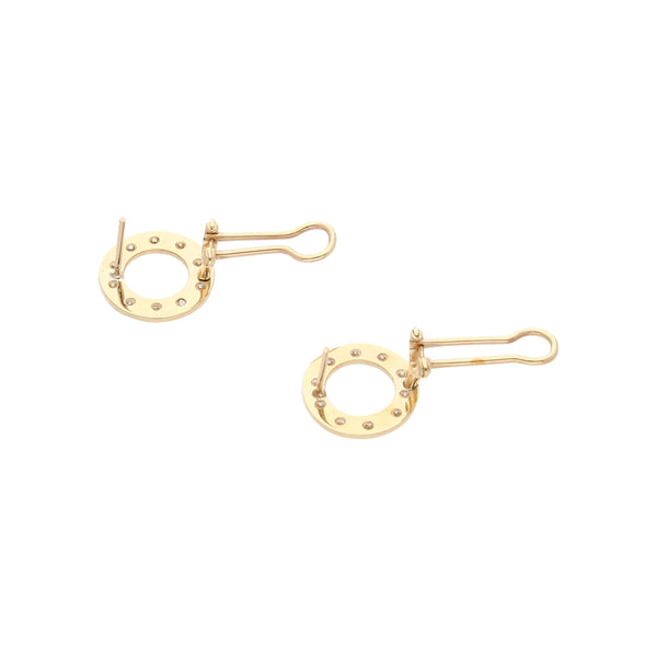 Aretes calados con diamantes en oro amarillo 14 kilates.