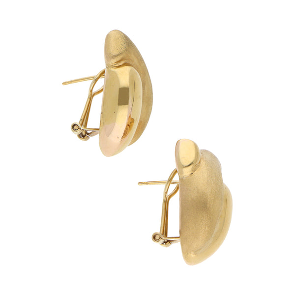 Aretes huecos en oro amarillo 14 kilates.