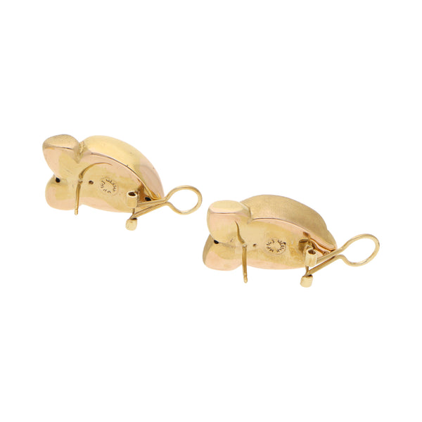 Aretes huecos en oro amarillo 14 kilates.