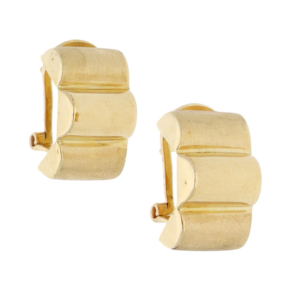 Aretes huecos acanalados en oro amarillo 14 kilates.