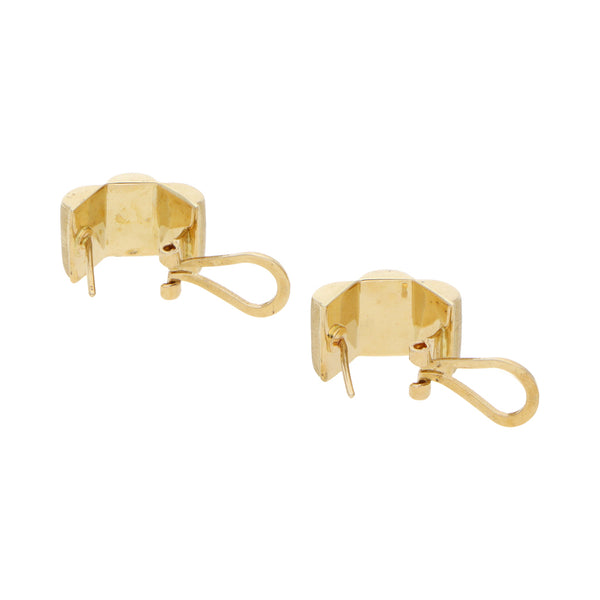 Aretes huecos acanalados en oro amarillo 14 kilates.