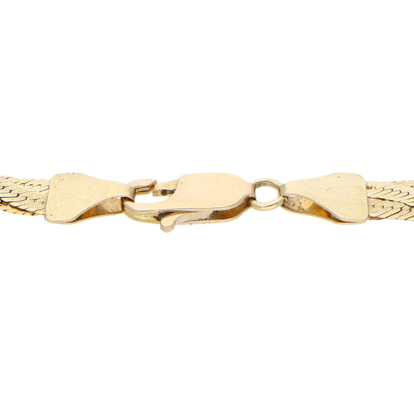 Pulsera tres hilos trenzada eslabón planchado en oro amarillo 14 kilates.