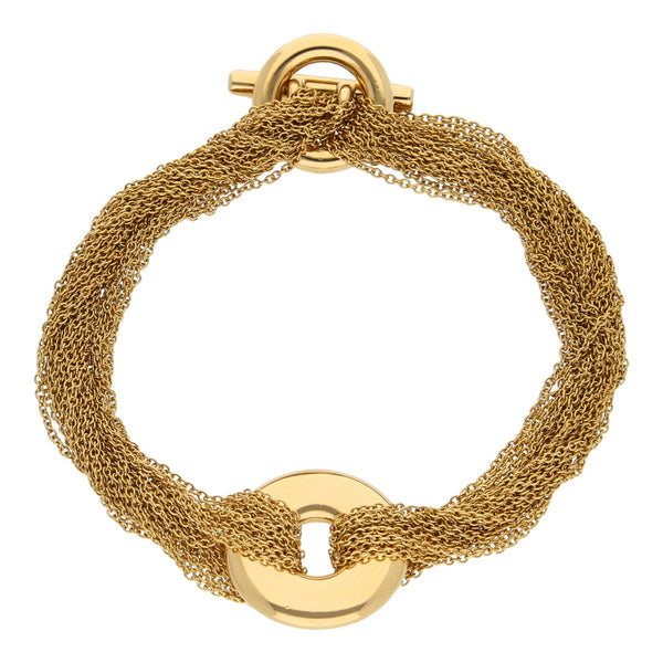 Pulsera trece hilos eslabón cruzado con aplicacion firma Tiffany & Co. en oro amarillo 18 kilates.