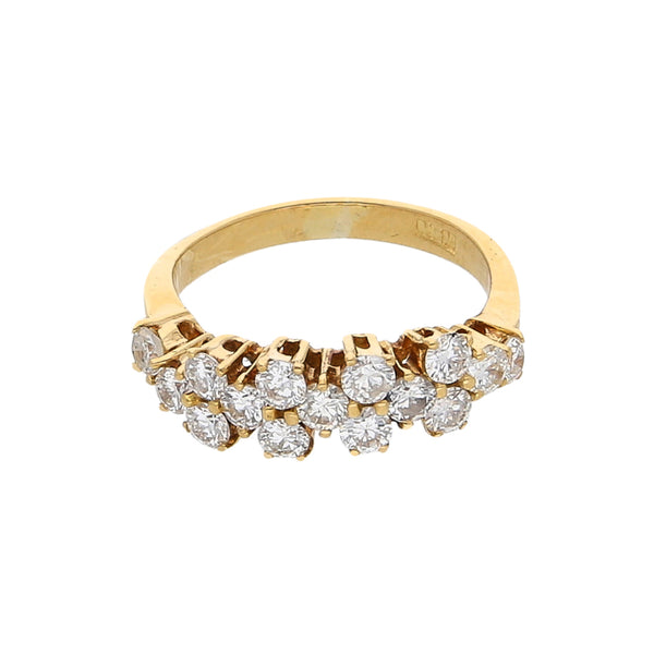 Anillo estilizado con diamantes en oro amarillo 18 kilates.