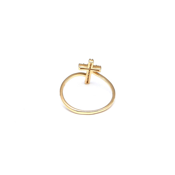 Anillo diseño especial motivo cruz con circonias en oro amarillo 14 kilates.