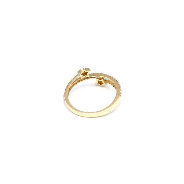 Anillo diseño especial motivo estrella con circonias en oro amarillo 14 kilates.