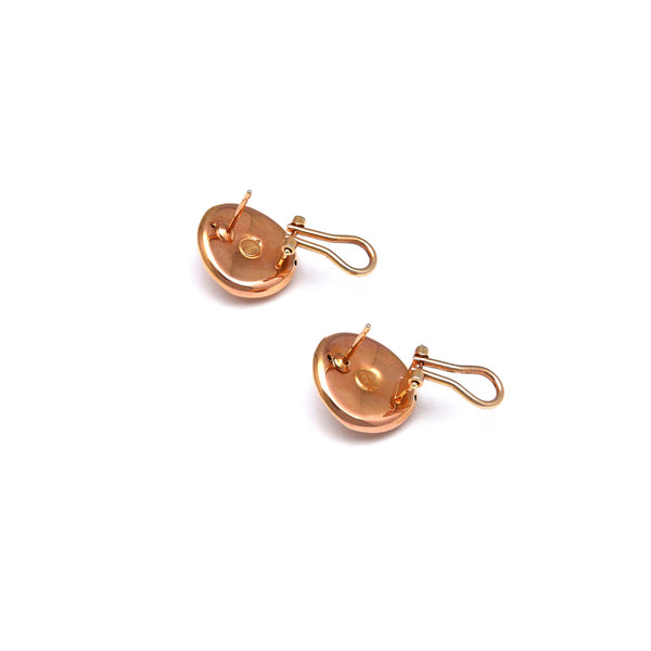 Aretes acanalados en oro rosa 14 kilates.