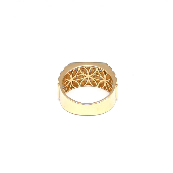 Anillo tipo sello con circonias en oro amarillo 14 kilates.