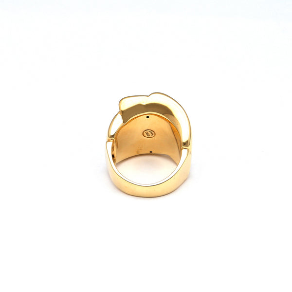 Anillo estilizado hueco en oro amarillo 14 kilates.