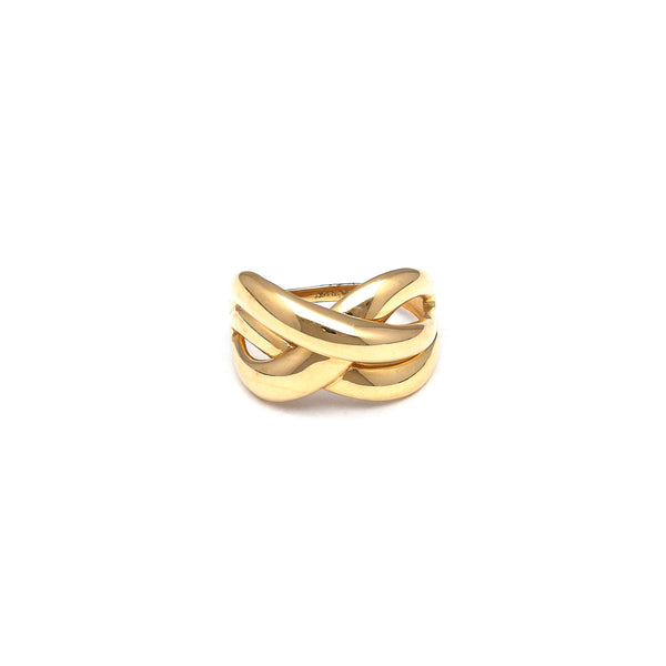 Anillo estilizado calado en oro amarillo 14 kilates.