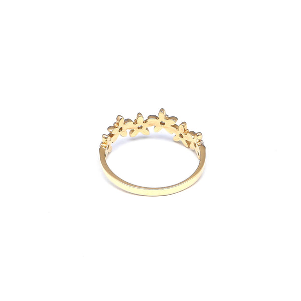 Anillo diseño especial motivo floral con circonias en oro amarillo 14 kilates.