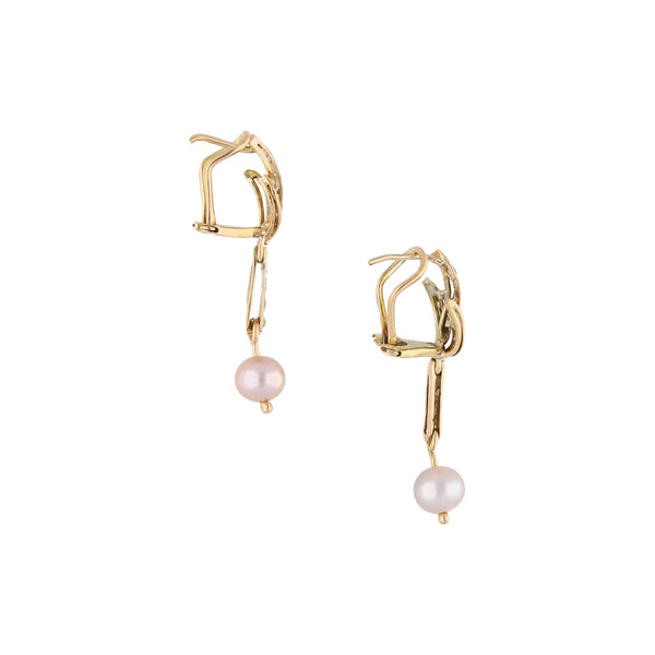 Aretes articulados con diamantes y perlas en oro amarillo 14 kilates.