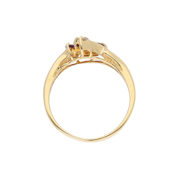 Anillo diseño especial con rubíes y circonia en oro amarillo 14 kilates.