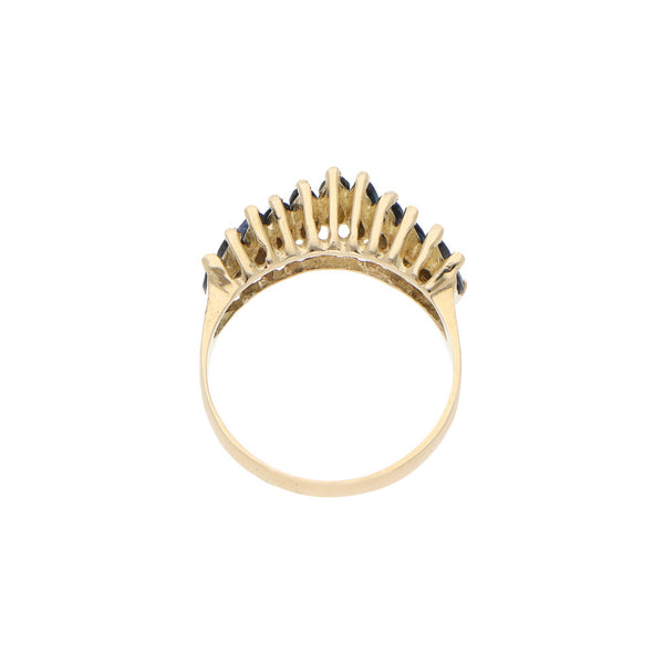 Anillo estilizado con zafiros en oro amarillo 14 kilates.