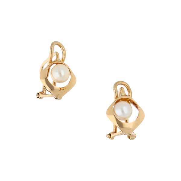 Aretes diseño especial con perlas en oro amarillo 14 kilates.