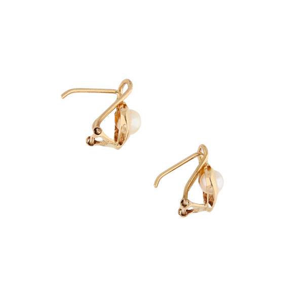 Aretes diseño especial con perlas en oro amarillo 14 kilates.