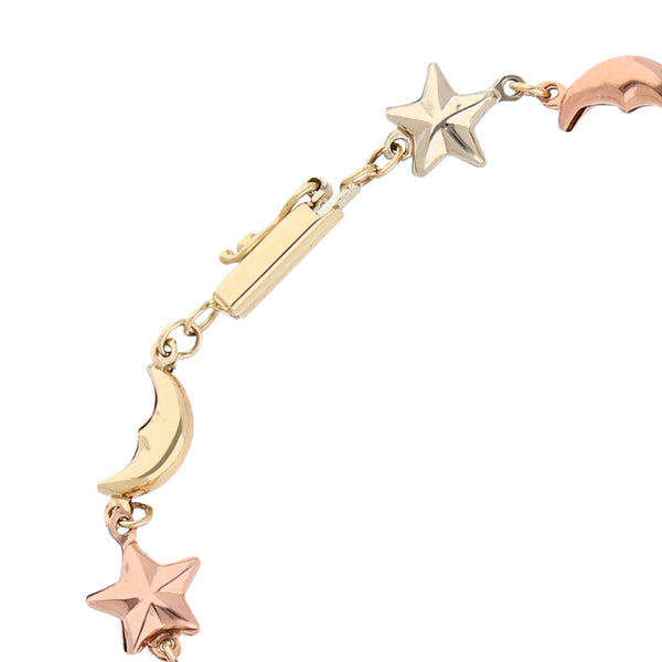 Pulsera eslabón combinado motivo estrellas y lunas en oro tres tonos 14 kilates.