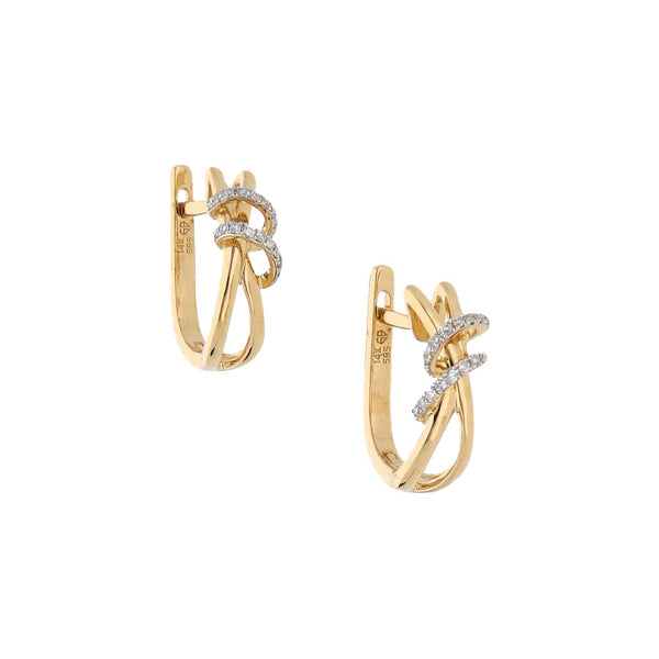 Aretes estilizados con diamantes en oro amarillo 14 kilates.