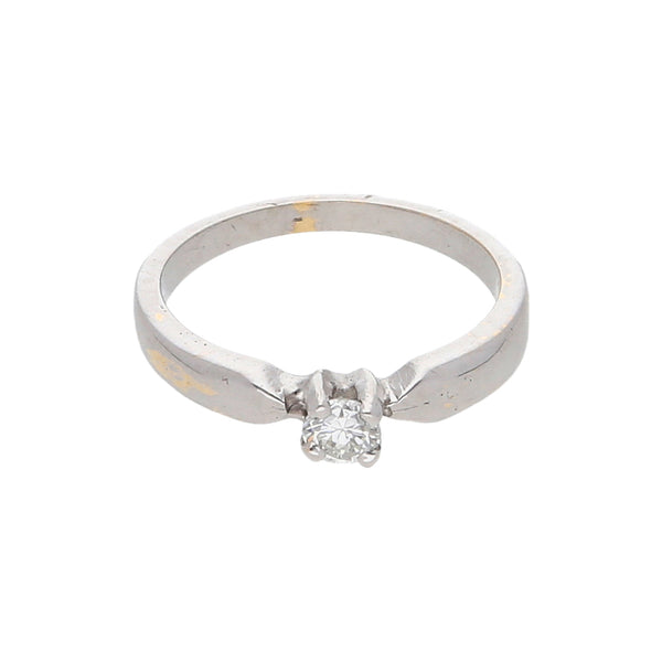 Anillo solitario con diamante en oro blanco 14 kilates.