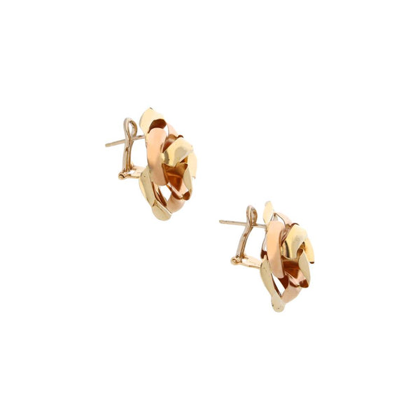 Aretes estilizados motivo floral en oro dos tonos 14 kilates.