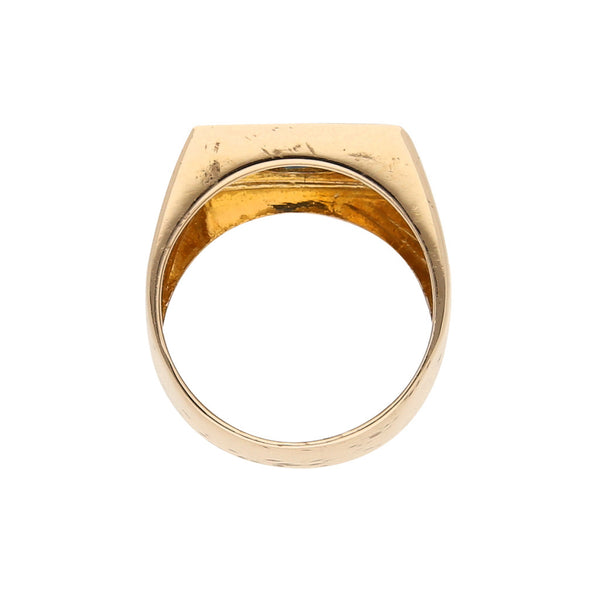 Anillo tipo sello con zafiro en oro amarillo 14 kilates.